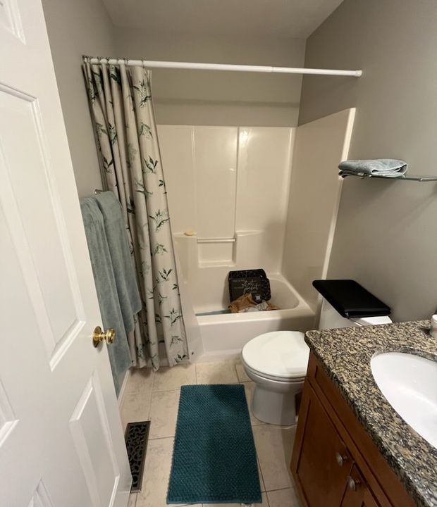 Bathroom shower remodel with clean tile and updated fixtures