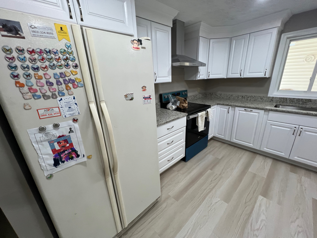 Kitchen remodeling project with improved layout and finishes